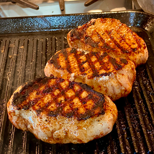 Pork loins on grill