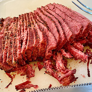Slices of corned beef on a board