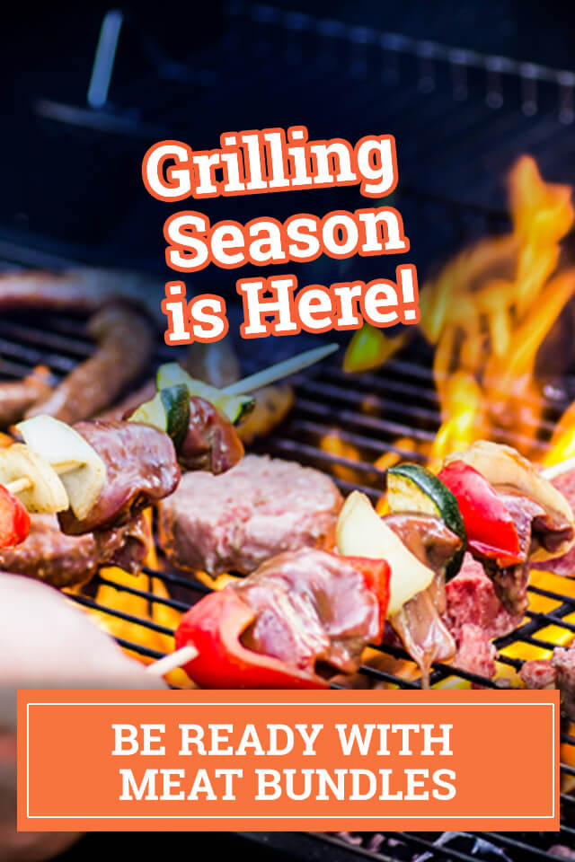 Grilling Season with meats and veggies grilling over flames